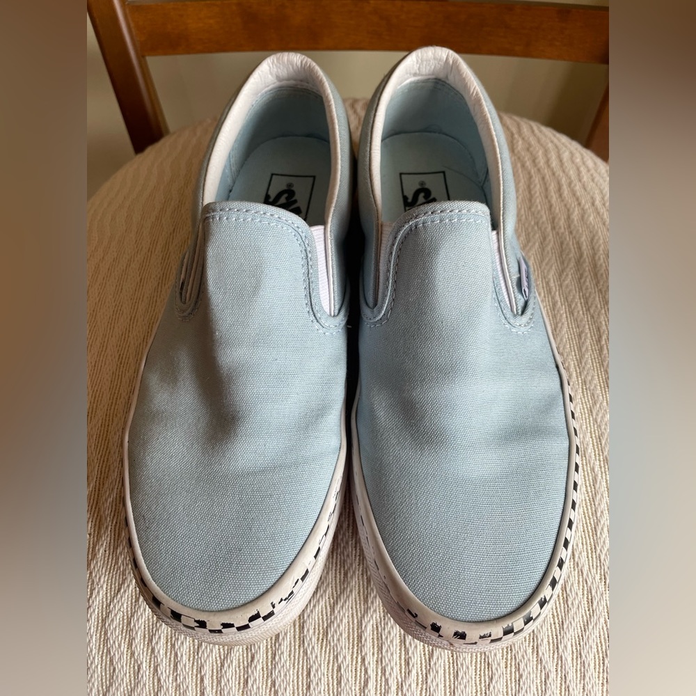 Light blue vans with checkered rim